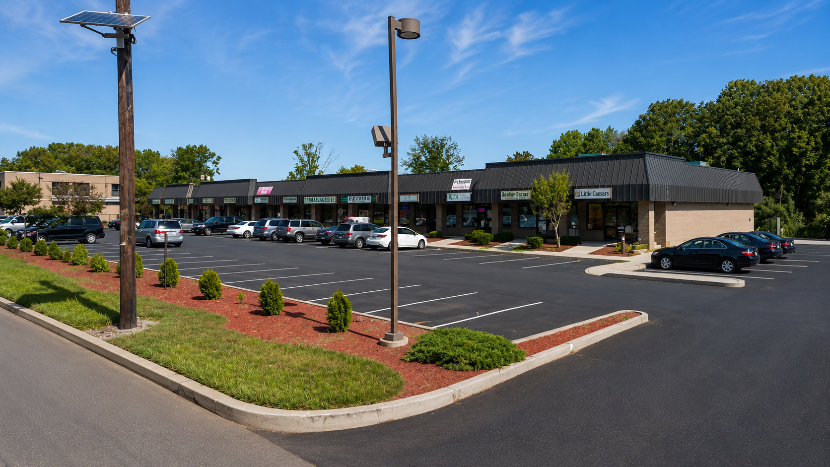 Finnegans Plaza before renovation — original 1980s facade North Brunswick NJ